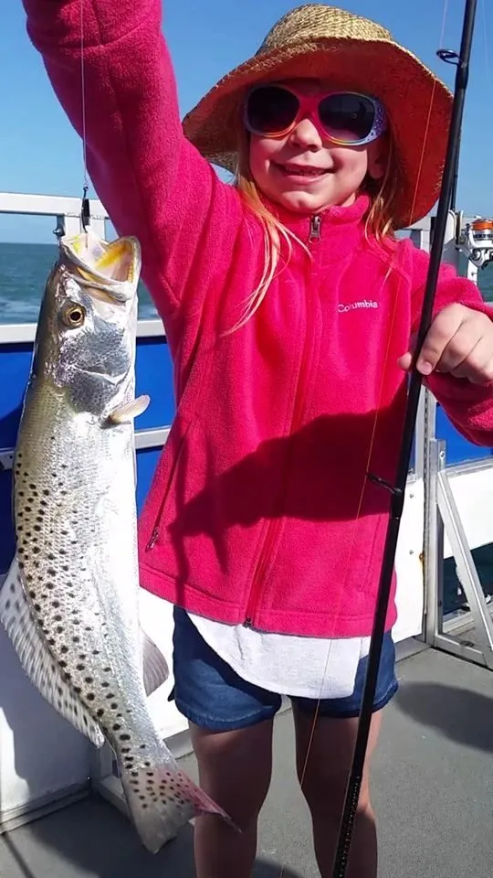 Kids enjoying a family-friendly fishing trip