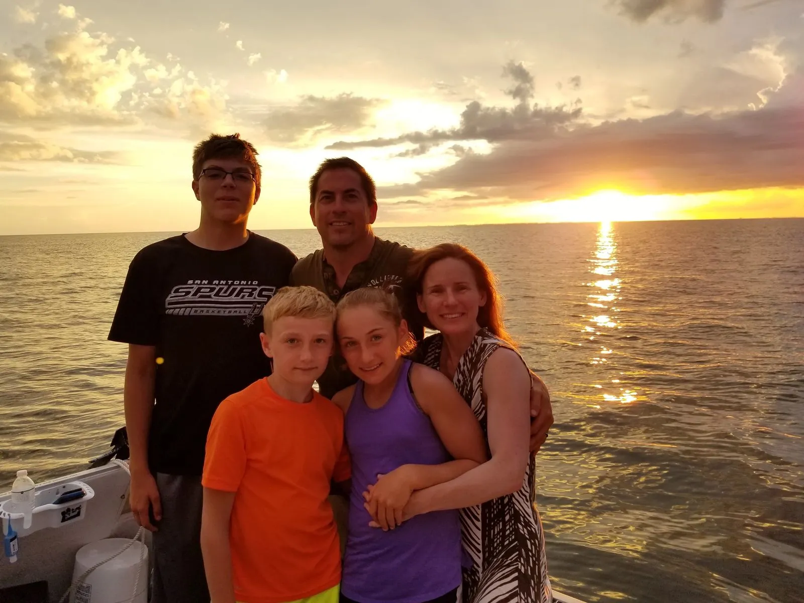 Golden sunset over the gulf seen from the boat